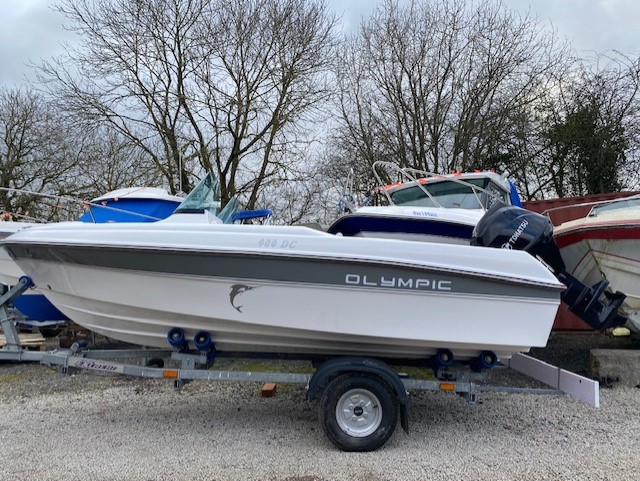 SOLD Used OLYMPIC 400DC with Tohatsu MFS30 and trailer